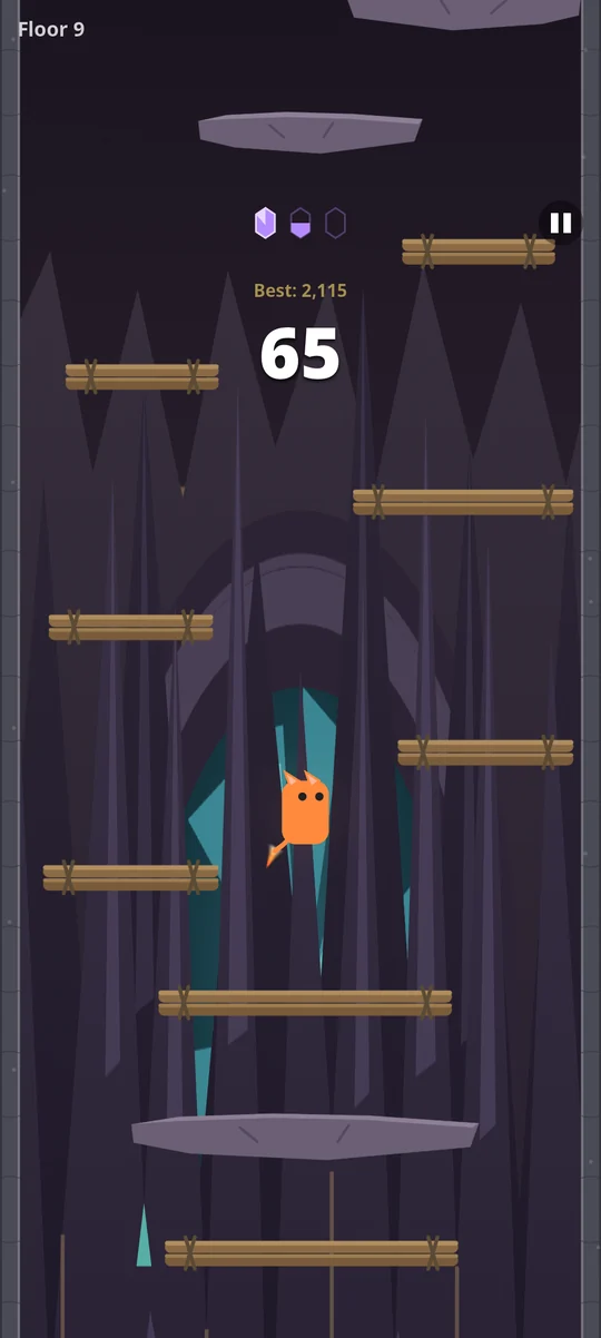 The climber mid jump between narrow wooden ledges, with the score reading 65.